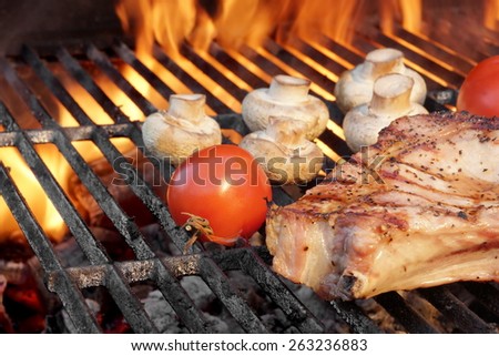 Rib Steak, Tomato and  Mushrooms Roasted Over Flaming BBQ Grill