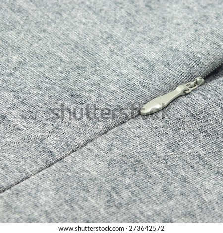 Grey Jersey Dress With Zipper Close-up Textured Abstract Background