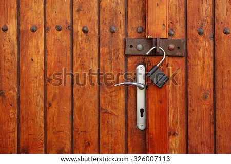 Vintage Rustic Grunge Brown Red Wooden Double Door Or Gate With Opened Padlock Background Texture