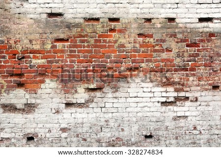 Textured Background Or Studio Backdrop Of Decayed Old Red And White Bricks In The Outdoor Uneven House Wall With Dirty Whitewashed Shabby Plaster