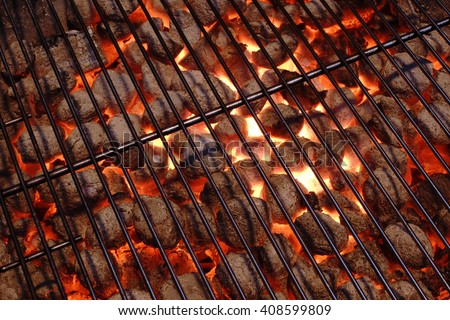 Empty And Clean BBQ Grill Pit With Glowing Hot Charcoal Briquettes In The Background, Close-Up, Top View. Concept For Outdoor Barbecue Party Or Picnic Or Cookout