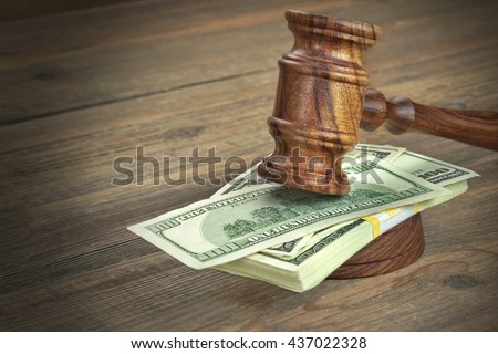 Judges or Auctioneer Gavel, Soundboard And Bundle Of Dollar Cash On The Rough Wooden Textured Table Background. Concept For Corruption, Bankruptcy Court, Bail, Crime, Bribing, Fraud, Auction Bidding.
