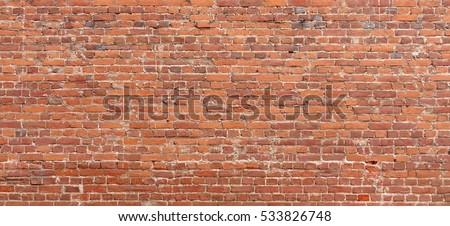 Old Red Brick Wall Wide Rough Texture. Solid Distressed Building Brown Facade Textured Urban Background.