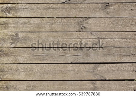 Grey Barn Wooden Wall Planking Texture. Old Solid Wood Slats Rustic Shabby Gray Background. Hardwood Dark Weathered Timber Surface. Grunge Faded Wood Board Panel Structure, Close Up