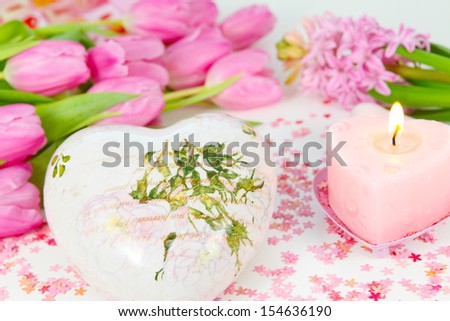 Decoration heart, heart candle and flowers