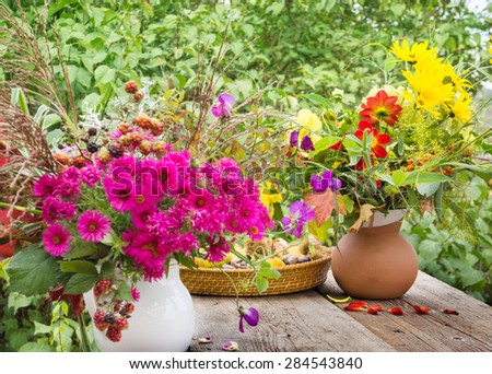 Autumn flowers, fall decoration on the terrace