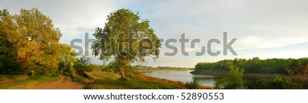 Evening. Coast of the river. Panoramic view.