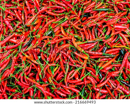 PILE OF RED CHILLIES IN  THE MARKET