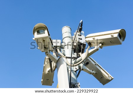 CCTV SECURITY CAMERAS FIXED ON POLE.
