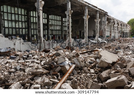 Abandoned destroyed factory building, industrial background