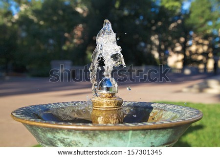 Drinking fountain with stream of water