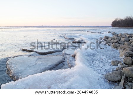 Winter shore line filled with ice
