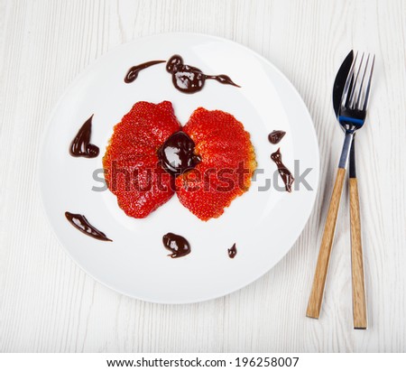 Strawberries with chocolate. funny food. Breakfast in the shape of a flower for kids.