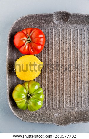 tomatoes ripe and unripe. traffic light in the kitchen. green, yellow, red