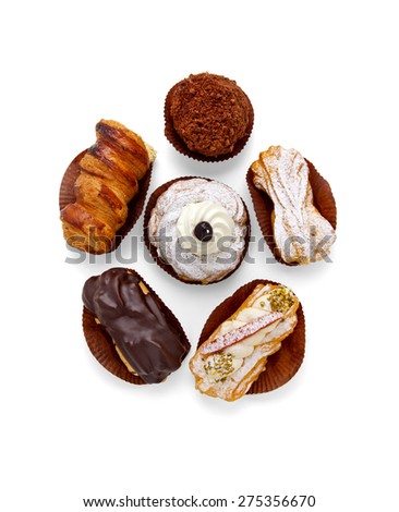different types of Italian puff pastries: with cream, nuts, chocolate, pistachio, sugar. profiteroles. Zeppole. sicilian sweets