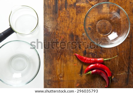 empty glass bowls  on a wooden table. space for writing the text, recipes, advertising or menu. background for restaurants