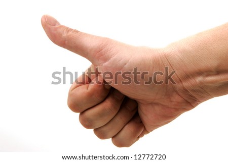 human hand with thump up as they usually do when asking for a lift on the roads