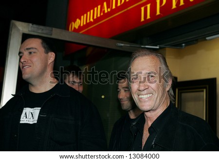 Actor David Carradine (right) and Alexander Nevsky, a film producer, arrive to Moscow to film a story on September 1, 2005.