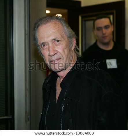 Actor David Carradine (front) and Alexander Nevsky, a film producer, arrive to Moscow to film a story on September 1, 2005.