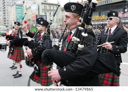 Bag pipers in Scotch outfit participate in the Saint Patrick\'s Day parade in Moscow, Russia, on March 16, 2008.