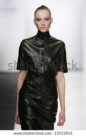 Model presents a creation from the  collection by Russian designer Teplov during the Russian Fashion Week in Moscow.