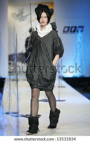 Model presents a creation from the  collection by Russian designer Makashova during the Russian Fashion Week in Moscow.