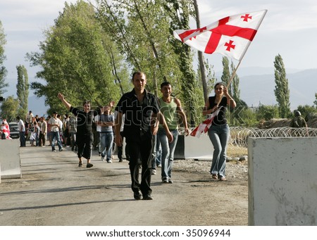 KARALETI, GEORGIA - SEPTEMBER 1: Young Georgians with national flags protest against Russian invasion September 1, 2008 near the village of Karaleti, some 80 km away from Tbilisi, capital of Georgia.
