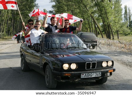 KARALETI, GEORGIA - SEPTEMBER 1: Young Georgians with national flags protest against Russian invasion September 1, 2008 near the village of Karaleti, some 80 km away from Tbilisi, capital of Georgia.