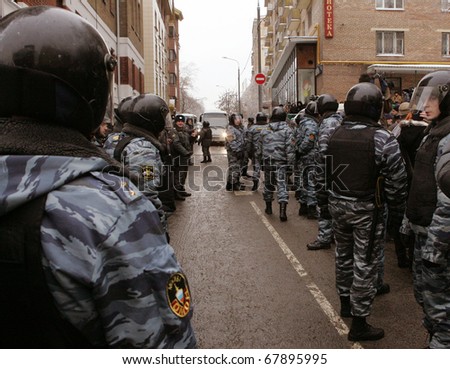 MOSCOW - DECEMBER 27: Riot police officers take guard of the court building where Yukos oil company chief executive officer Mikhail Khodorkovsky's case is heard 27, 2010 in Moscow, Russia.