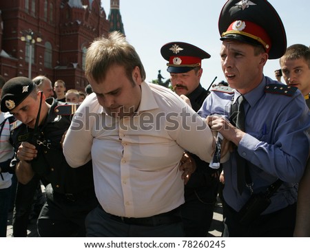 MOSCOW - MAY 28: Russian police detain a gay rights activist during an attempt to hold the unauthorized gay pride parade on May 28, 2011 in Moscow, Russia.