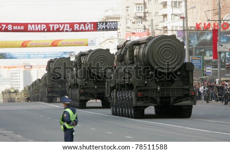 MOSCOW - MAY 9: Russian Army Topol intercontinental ballistic missiles roll down Moscow streets during the Victory Day military parade May 9, 2011 in Moscow, Russia.