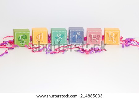 Colorful Pastel  EASTER blocks on a white background with negative space for wording