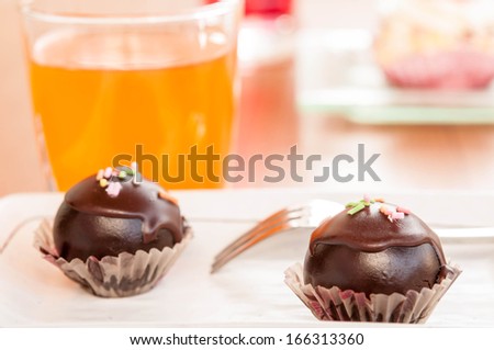 Chocolate Ball cake with softdrink or Juice.