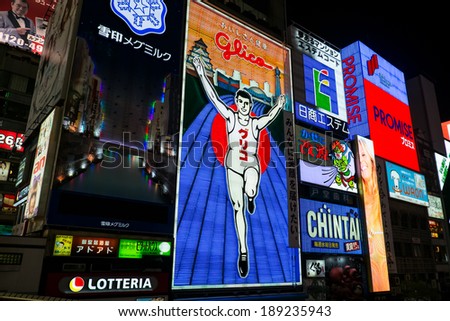 OSAKA, JAPAN - MAY 21: The Glico Man light billboard and other light displays on May 21, 2013 in Dontonbori, Namba Osaka area, Osaka, Japan.