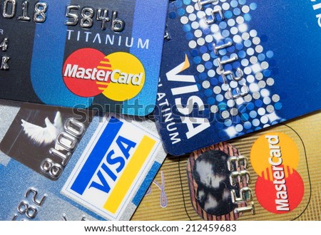 Chonburi, Thailand - August 23, 2014 : Close Up old and new Logo on Credit Cards issued by the VISA and Master Card