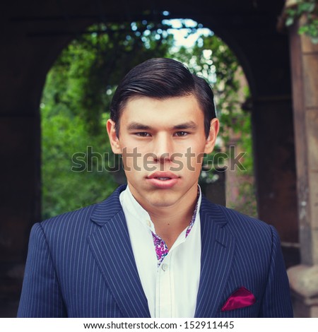 Fashionable young man outdoor. Square format