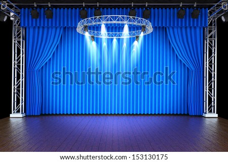 Theater stage with blue curtains and spotlights