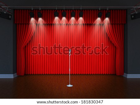vintage microphone on Theater stage with red curtains and spotlights Theatrical scene in the light of searchlights, the interior of the old theater