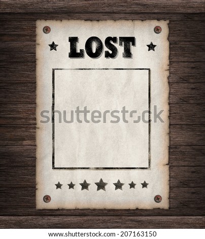Torn Wild West Lost poster on old wooden wall