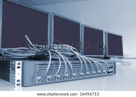 Network communication device with ethernet cables and computers in training room