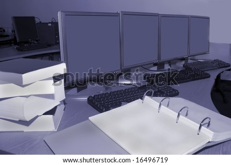 Computer training room with books in laboratory