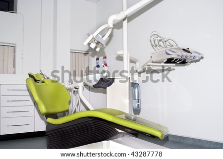 High tech dentist operating suite chair and instruments