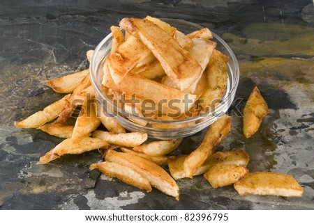 Freshly prepared  fried chips from new potatoes