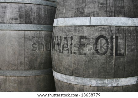 Horizontal image of 2 old wooden barrels of oil