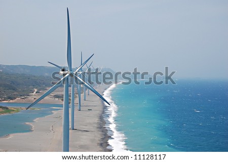 a wind farm seen atop of another with turbine in the philippines
