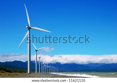a windfarm on a single row in bangui bay, philippines