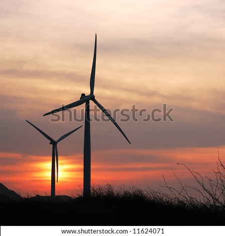 a windfarm at dusk in bangui bay, philippines