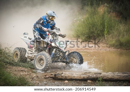 TERUEL, ARAGON/SPAIN - JULY 19: rider, Alexandre Giroud, tries to get a good result on SS1 in Baja Aragon Rally on July 19, 2014 in Teruel