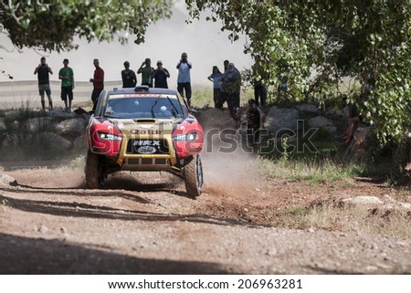 TERUEL, ARAGON/SPAIN - JULY 19: Qatari Driver, Nasser Al-Attiyah tries to get a good result in SS1 in Baja Aragon Rally on July 19, 2014 in Teruel