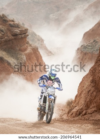 TERUEL, ARAGON/SPAIN - JULY 18: Spanish Rider, Txomin Arana, tries to get a good result in Prologue in Baja Aragon Rally on July 18, 2014 in Teruel